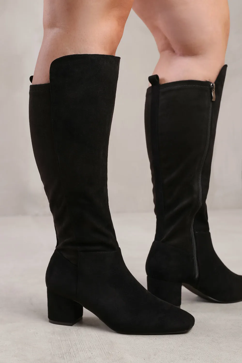 BEAU STRETCH WIDE CALF BLOCK HEEL KNEE HIGH BOOTS WITH SIDE ZIP IN WIDE E FIT IN BLACK SUEDE